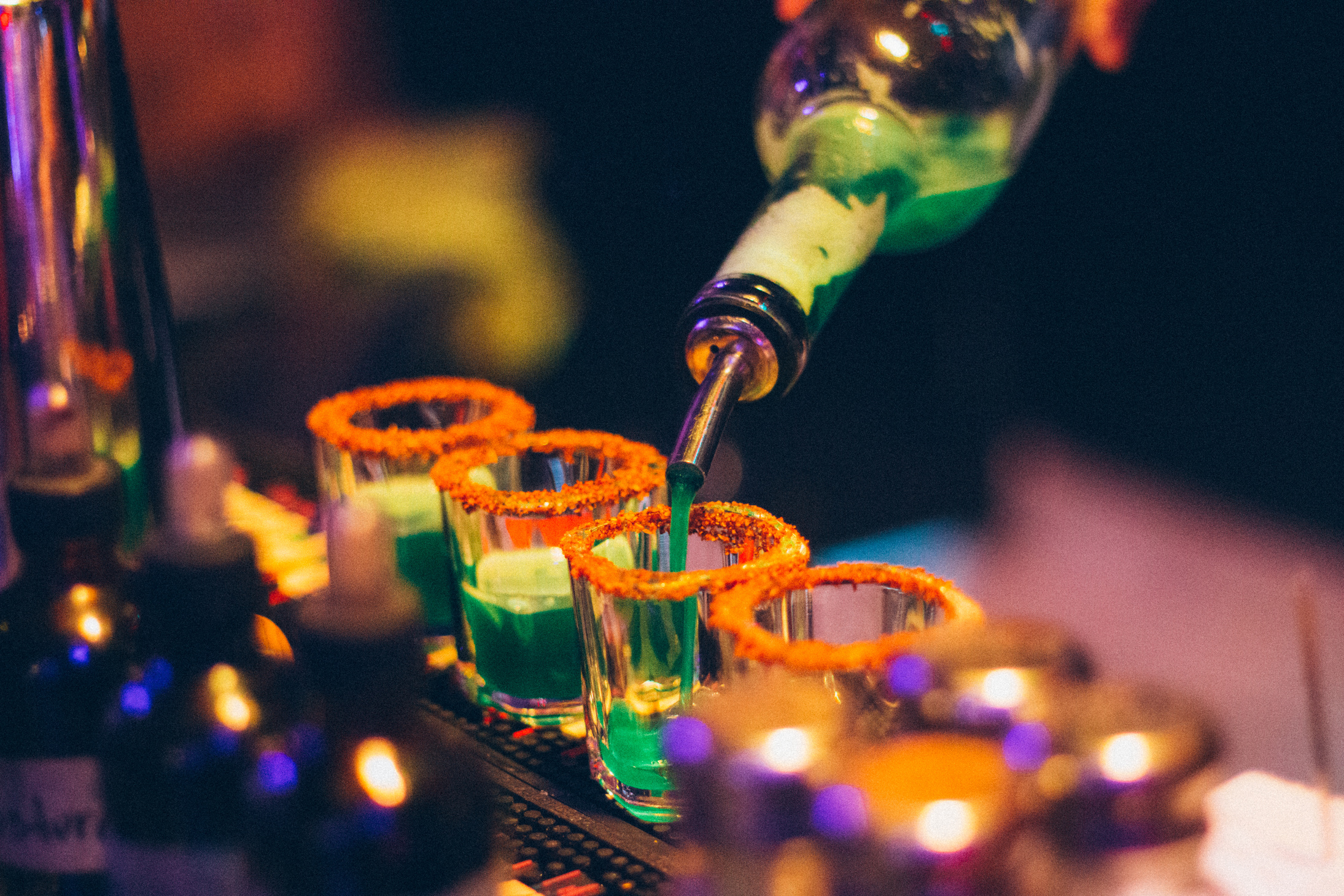 Pouring Cocktail into Glasses